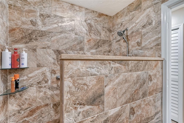4555 Chandlers Forde Unit 47, Sarasota, FL 34235 - bathroom view of a tile shower