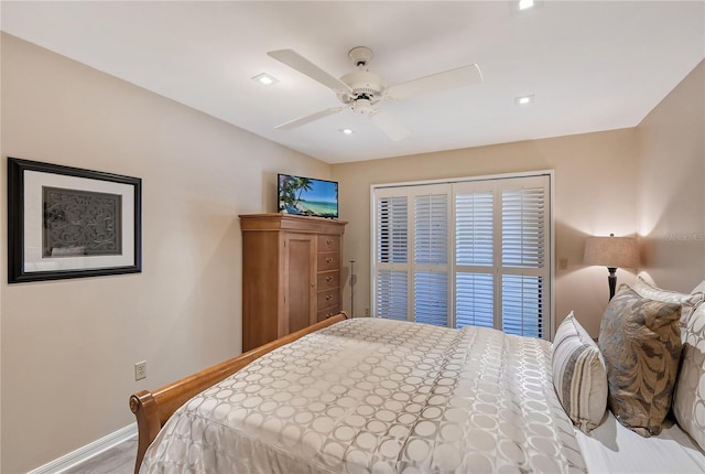 4555 Chandlers Forde Unit 47, Sarasota, FL 34235 - bedroom with a ceiling fan and baseboards