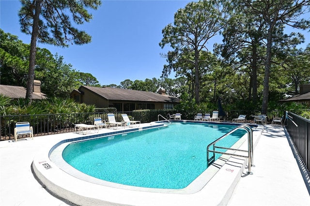 4555 Chandlers Forde Unit 47, Sarasota, FL 34235 - community pool featuring a patio area