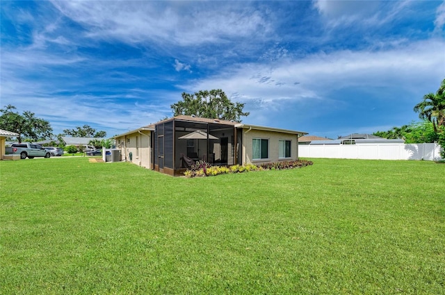 6804 19th Ave W, Bradenton, FL 34209 - rear view of house featuring a sunroom