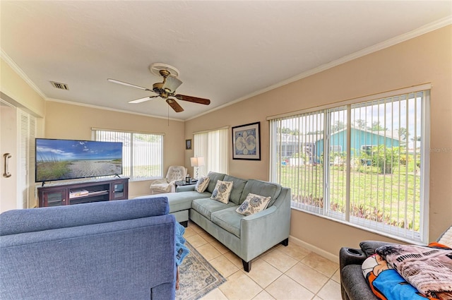 6804 19th Ave W, Bradenton, FL 34209 - living room with light tile patterned flooring, ornamental molding, and a ceiling fan
