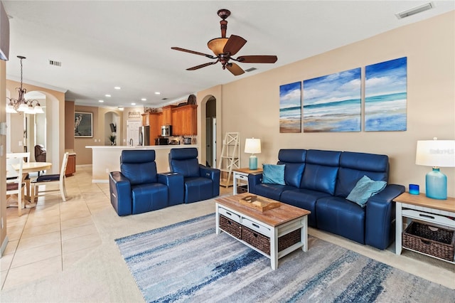 866 Oak Briar Ln, Osprey, FL 34229 - living room featuring arched walkways, ceiling fan, a chandelier, recessed lighting, and baseboards
