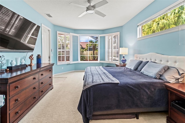866 Oak Briar Ln, Osprey, FL 34229 - bedroom with carpet floors, baseboards, and a ceiling fan