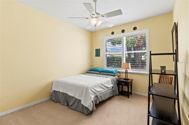 866 Oak Briar Ln, Osprey, FL 34229 - bedroom with carpet flooring, baseboards, and ceiling fan