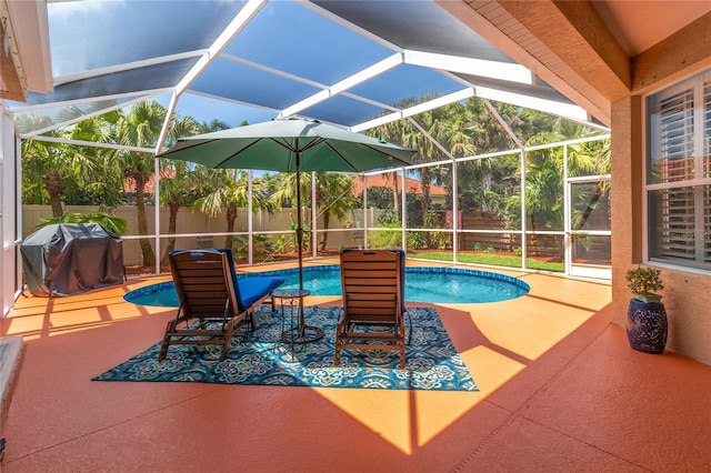 866 Oak Briar Ln, Osprey, FL 34229 - view of swimming pool with a fenced backyard, area for grilling, a patio, and glass enclosure