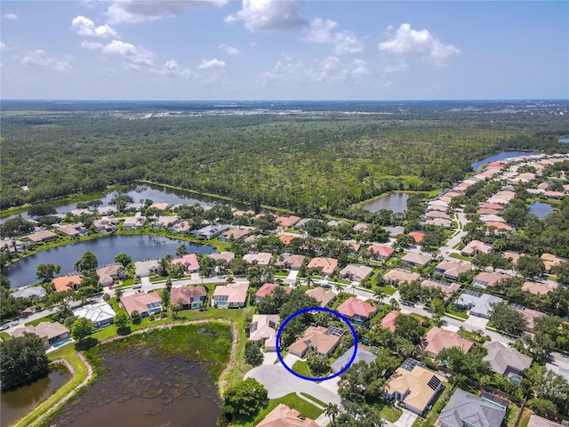 866 Oak Briar Ln, Osprey, FL 34229 - aerial view of property's location with a heavily wooded area, a nearby body of water, and nearby suburban area