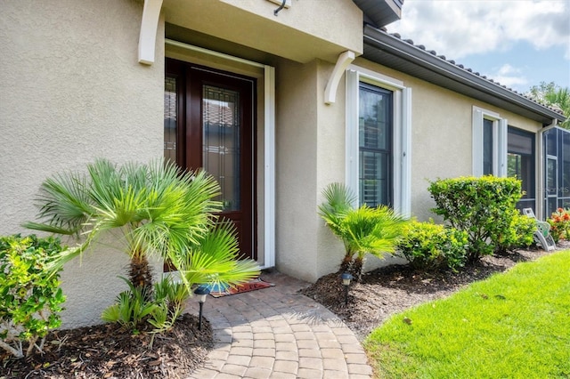 5117 Serata Dr, Bradenton, FL 34211 - doorway to property featuring stucco siding