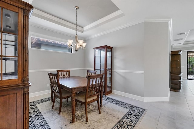 5117 Serata Dr, Bradenton, FL 34211 - dining room featuring a chandelier, ornamental molding, light tile patterned floors, baseboards, and a raised ceiling