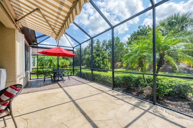 5117 Serata Dr, Bradenton, FL 34211 - sunroom / solarium featuring outdoor dining space