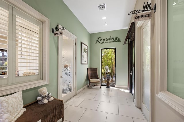 5117 Serata Dr, Bradenton, FL 34211 - living area with tile patterned floors, baseboards, and recessed lighting