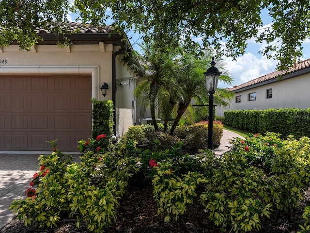 4949 Savona Run, Bradenton, FL 34211 - mediterranean / spanish-style home with stucco siding and an attached garage
