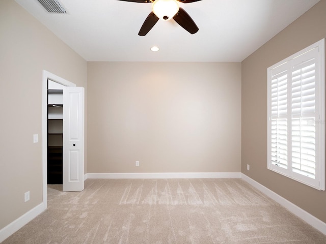 4949 Savona Run, Bradenton, FL 34211 - spare room with light colored carpet, ceiling fan, and recessed lighting