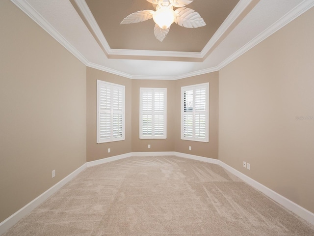 4949 Savona Run, Bradenton, FL 34211 - unfurnished room with a raised ceiling, light colored carpet, a ceiling fan, and crown molding