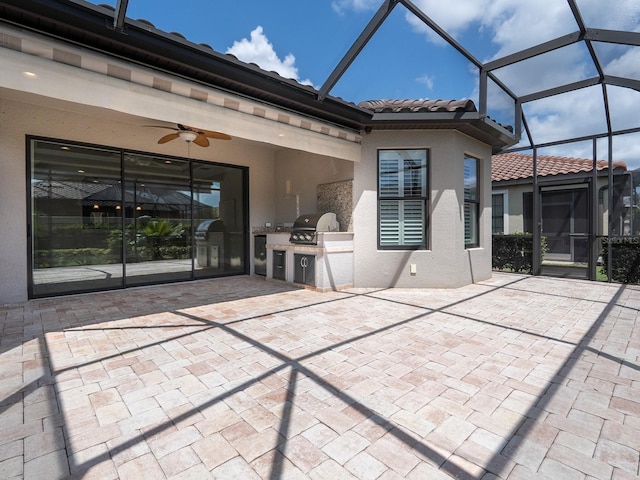 4949 Savona Run, Bradenton, FL 34211 - view of patio with an outdoor kitchen, ceiling fan, and a lanai
