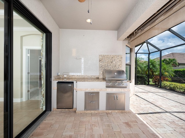 4949 Savona Run, Bradenton, FL 34211 - view of patio / terrace with exterior kitchen and glass enclosure