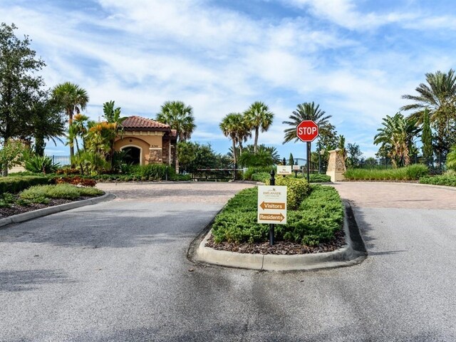 4949 Savona Run, Bradenton, FL 34211 - view of asphalt street featuring curbs and traffic signs