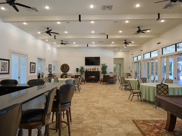 4949 Savona Run, Bradenton, FL 34211 - dining area featuring a ceiling fan, french doors, recessed lighting, a high ceiling, and crown molding