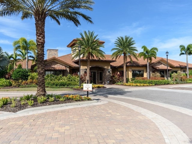4949 Savona Run, Bradenton, FL 34211 - view of building exterior featuring curved driveway
