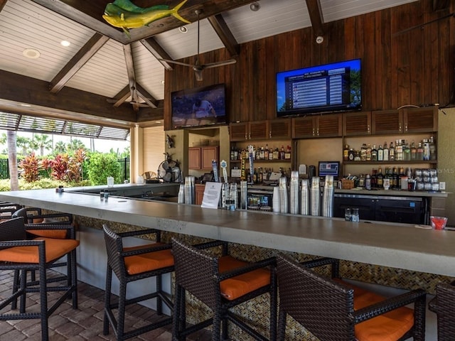 4949 Savona Run, Bradenton, FL 34211 - indoor dry bar with wood ceiling, brick patterned flooring, and wood walls