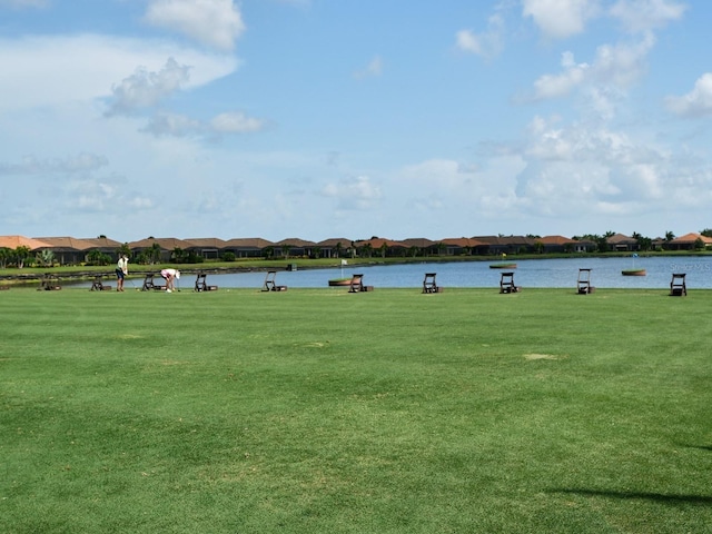4949 Savona Run, Bradenton, FL 34211 - view of home's community with a residential view, a water view, and a lawn