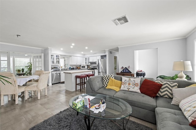 2204 67th St W, Bradenton, FL 34209 - living area featuring ornamental molding and recessed lighting