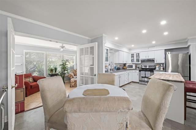 2204 67th St W, Bradenton, FL 34209 - dining space featuring crown molding, recessed lighting, and a ceiling fan
