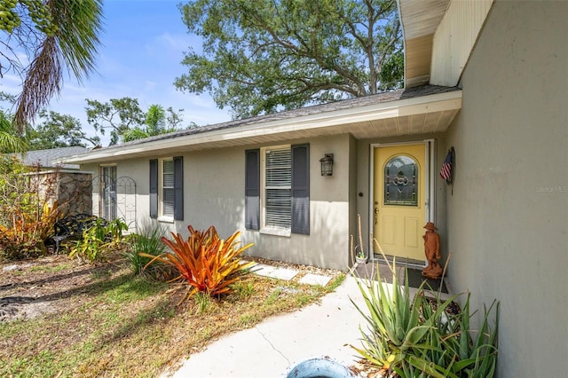 2204 67th St W, Bradenton, FL 34209 - property entrance featuring stucco siding