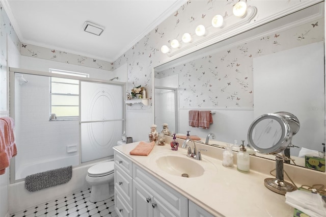 2204 67th St W, Bradenton, FL 34209 - full bath featuring crown molding, wallpapered walls, vanity, toilet, and wainscoting