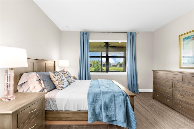 6791 Alstead Cir, Bradenton, FL 34202 - bedroom with wood finished floors and baseboards