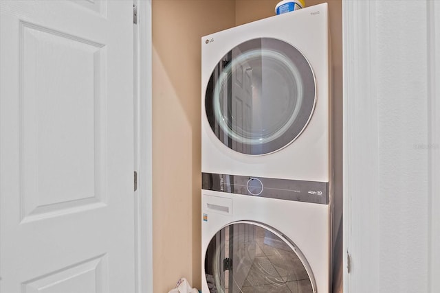 7325 Skybird Rd Unit 399, Bradenton, FL 34209 - washroom with stacked washing machine and dryer