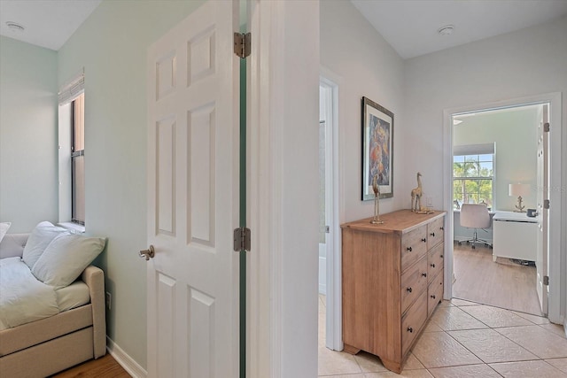 7325 Skybird Rd Unit 399, Bradenton, FL 34209 - corridor with a desk and light tile patterned flooring