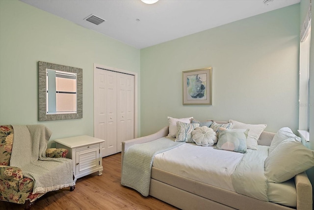 7325 Skybird Rd Unit 399, Bradenton, FL 34209 - bedroom with light wood-style floors and a closet