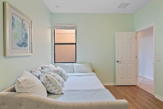7325 Skybird Rd Unit 399, Bradenton, FL 34209 - bedroom featuring wood finished floors and baseboards