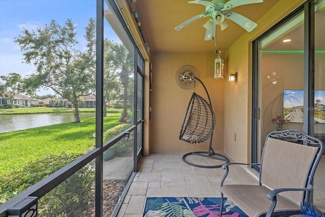 7325 Skybird Rd Unit 399, Bradenton, FL 34209 - sunroom / solarium with a water view and ceiling fan