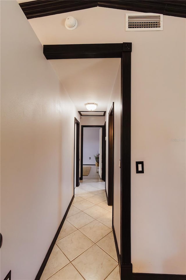 4945 Camphor Ave, Sarasota, FL 34231 - hallway with light tile patterned flooring