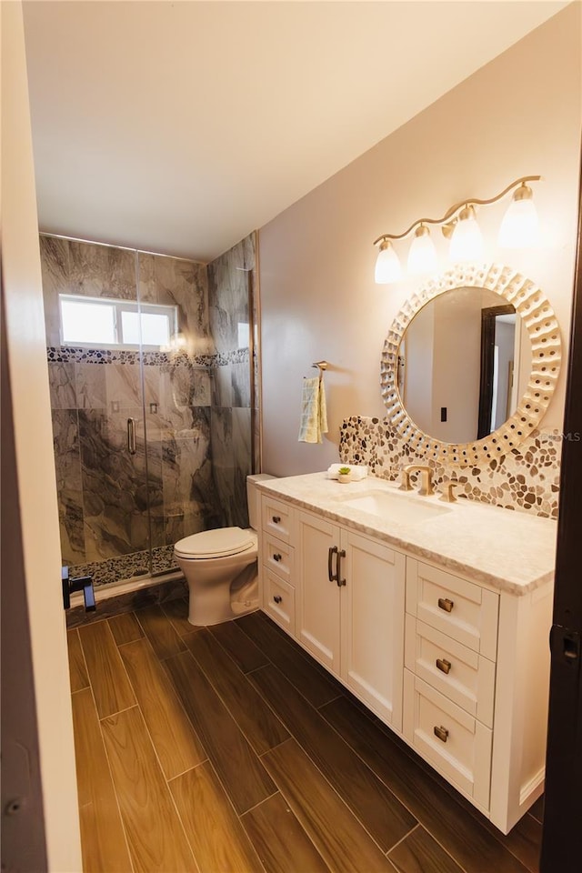 4945 Camphor Ave, Sarasota, FL 34231 - bathroom with a stall shower, vanity, and wood finish floors
