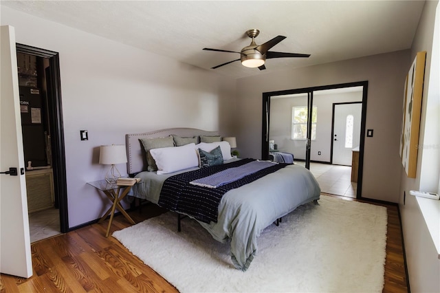 4945 Camphor Ave, Sarasota, FL 34231 - bedroom with wood finished floors and a ceiling fan