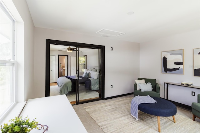 4945 Camphor Ave, Sarasota, FL 34231 - living area featuring attic access and light tile patterned floors