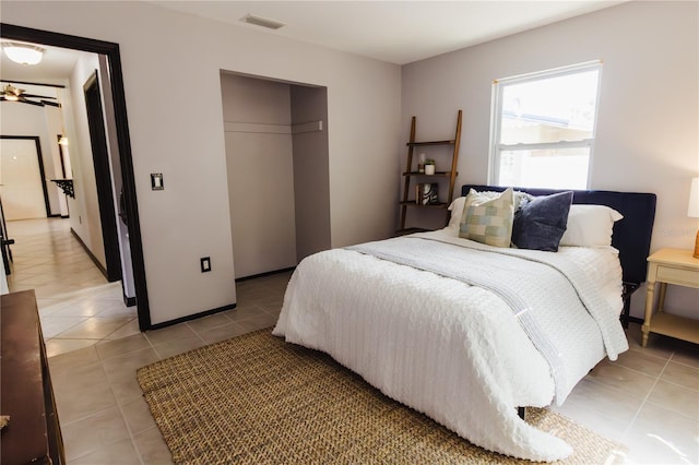 4945 Camphor Ave, Sarasota, FL 34231 - bedroom featuring light tile patterned floors and a closet