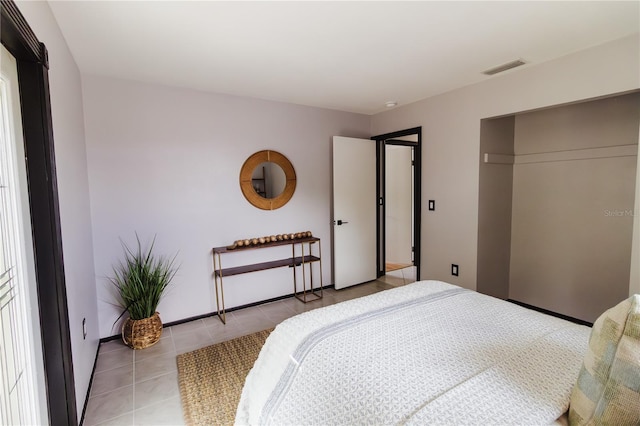 4945 Camphor Ave, Sarasota, FL 34231 - bedroom featuring tile patterned flooring and a closet