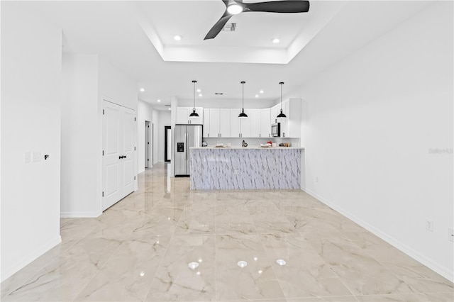 920 Barton St E, Lehigh Acres, FL 33974 - unfurnished living room with recessed lighting, baseboards, light marble finish flooring, ceiling fan, and a raised ceiling