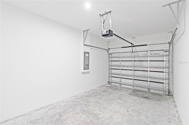 920 Barton St E, Lehigh Acres, FL 33974 - garage with electric panel and a garage door opener