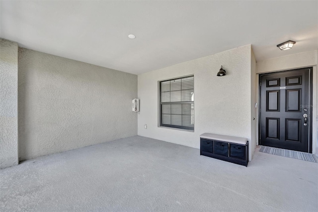 5695 Palmer Cir Unit 203, Bradenton, FL 34211 - view of exterior entry with stucco siding
