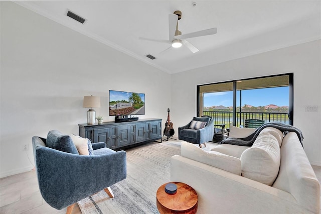 5695 Palmer Cir Unit 203, Bradenton, FL 34211 - living area with lofted ceiling, a ceiling fan, and crown molding