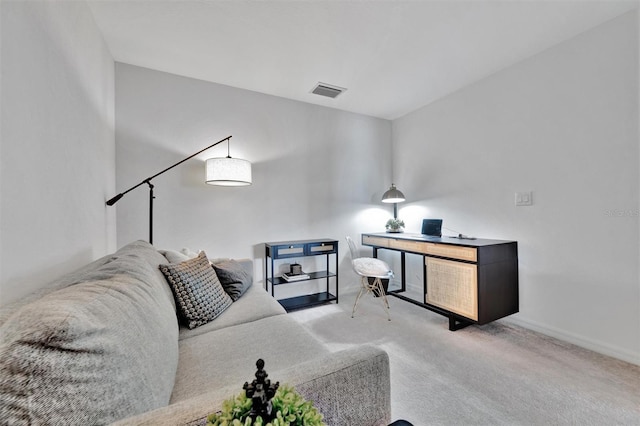 5695 Palmer Cir Unit 203, Bradenton, FL 34211 - carpeted living area featuring baseboards and a desk