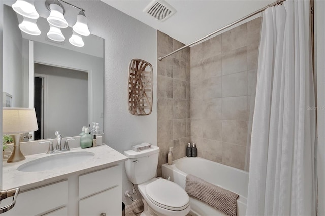 5695 Palmer Cir Unit 203, Bradenton, FL 34211 - bathroom with vanity, shower / bathtub combination with curtain, and a textured wall