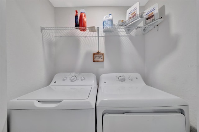5695 Palmer Cir Unit 203, Bradenton, FL 34211 - laundry area with washer and dryer