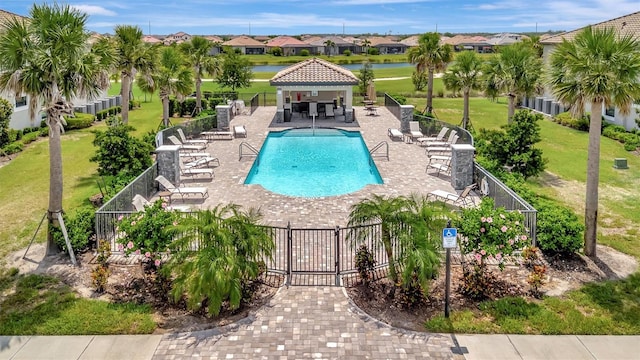 5695 Palmer Cir Unit 203, Bradenton, FL 34211 - community pool with a residential view, a patio area, a water view, and a gazebo