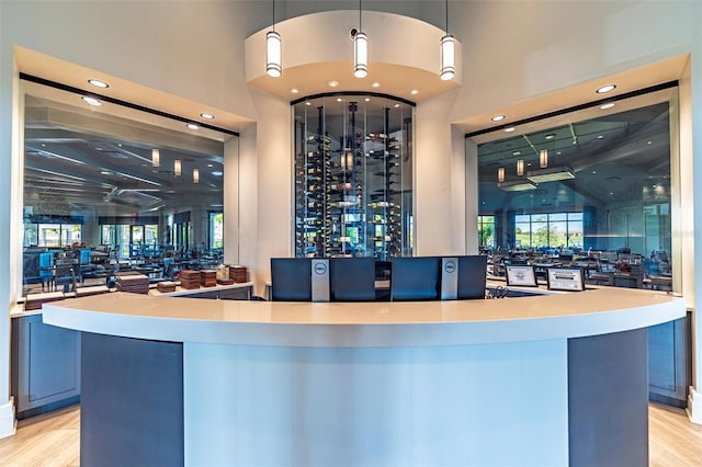 5695 Palmer Cir Unit 203, Bradenton, FL 34211 - community bar area with recessed lighting, light wood finished floors, decorative light fixtures, and plenty of natural light