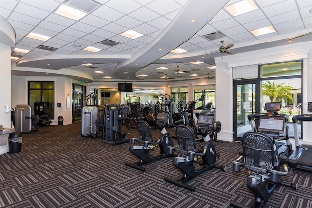 5695 Palmer Cir Unit 203, Bradenton, FL 34211 - gym featuring carpet floors, a drop ceiling, and a ceiling fan
